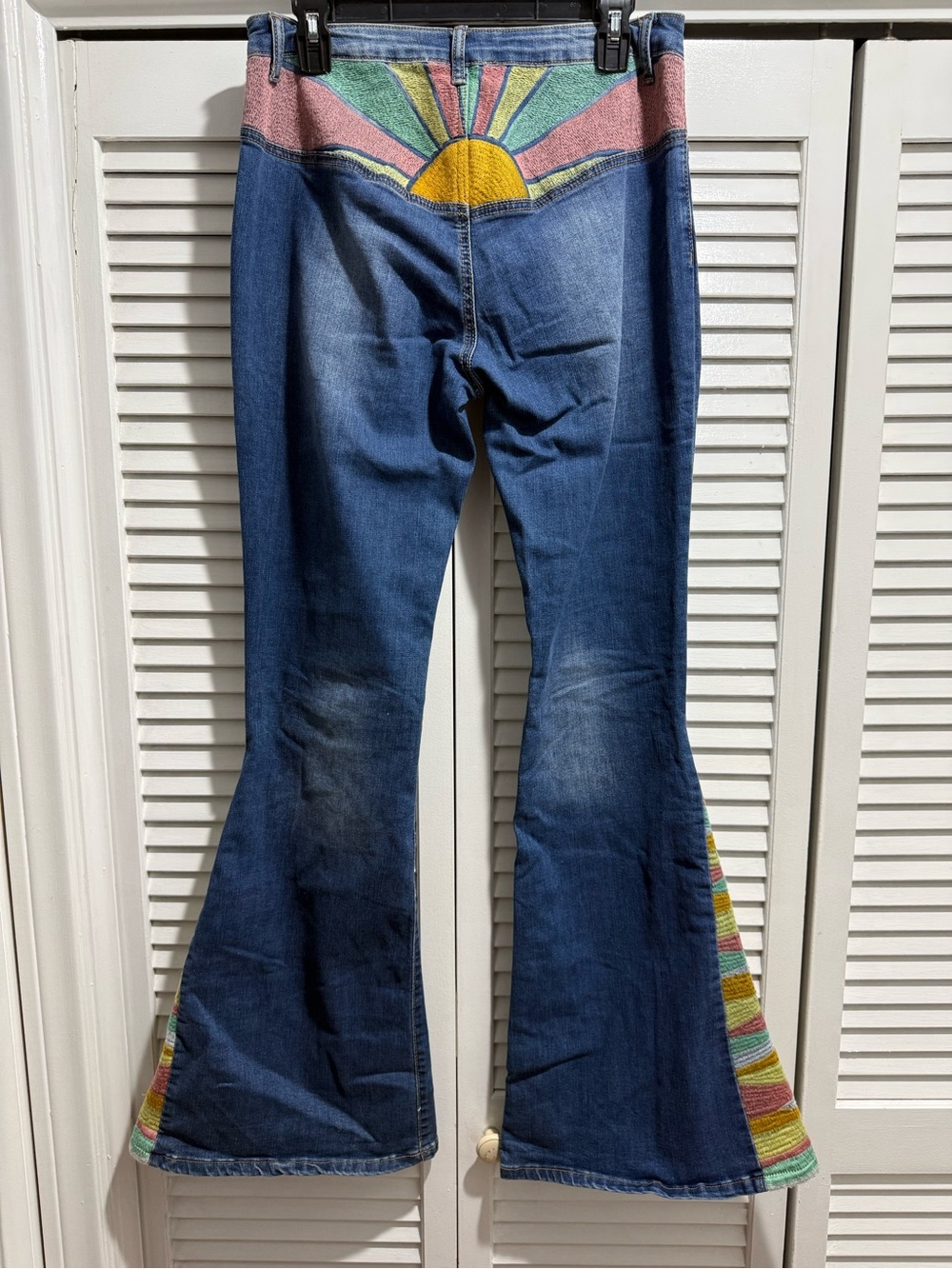 Women's Blue Flare Jeans with Multicolor Sunburst Waist Detail